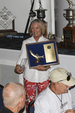 Debbie M. with the Gamse Trophy of Champions, with 71 releases